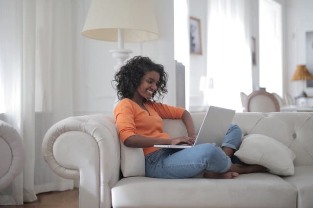 person-on-couch-with-computer